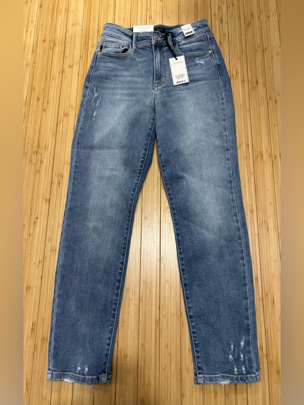 Judy Blue High Waist Distressed & Back Hem Dart Slim Jeans. NWT. Size 1/25.